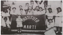 Frank País niño y su maestro